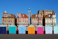  Colourful beach huts on Brighton seafront.